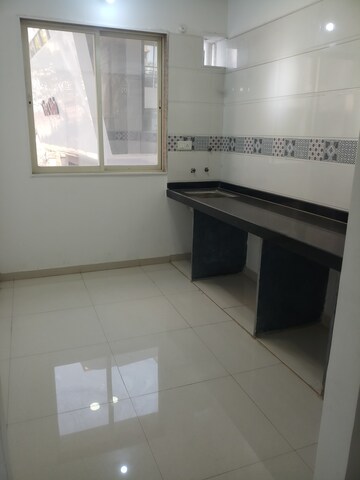Kitchen in 1 BHK Apartment at Raj Shreeji Iconic, Badlapur East – for Sale