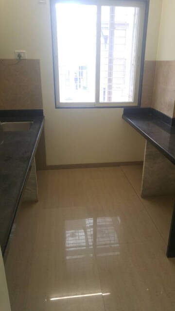 Kitchen in 2 BHK Apartment at Aryan One, Badlapur East – for Rent