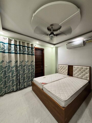 Bedroom in 3 BHK Builder Floor at Ansal Plaza Sector-23, Sector 23 – for Rent