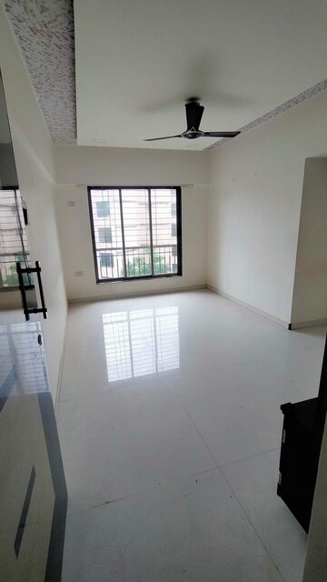 Room in 1 BHK Apartment at Mahindra Roots, Kandivali East – for Rent