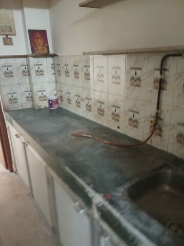 Kitchen in 1 BHK Apartment at Sagar Sangeet CHS, Borivali West – for Rent