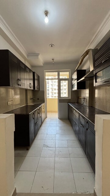 Kitchen in 4 BHK Apartment at 3C Lotus 300, Sector 107 – for Rent