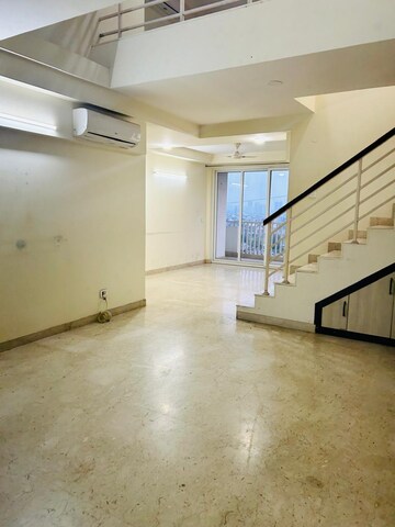 Living Room in 6 BHK Penthouse at Emaar The Palm Drive-Palm Studios, Sector 66 – for Sale