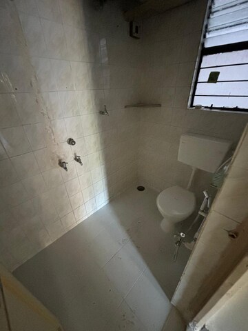 Bathroom in 2 BHK Apartment at Vyas Aasawari CHS, Ideal Colony – for Rent