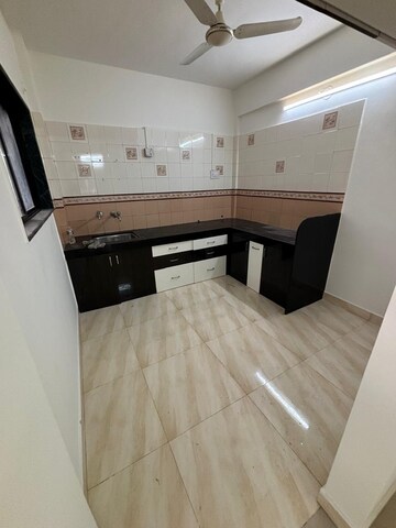 Kitchen in 2 BHK Apartment at Vyas Aasawari CHS, Ideal Colony – for Rent