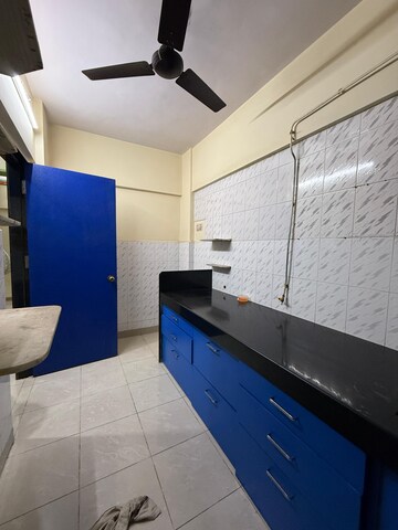 Kitchen in 1 BHK Apartment at Om Krishna CHS, Dahisar East – for Sale