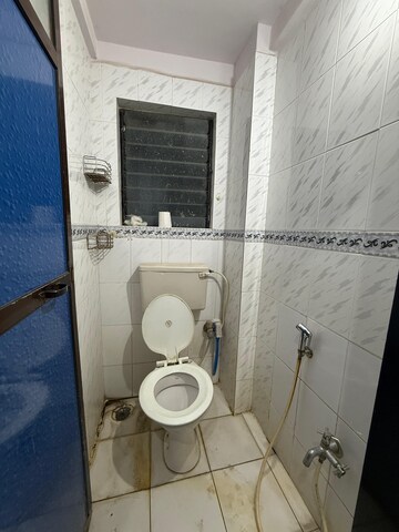 Bathroom in 1 BHK Apartment at Om Krishna CHS, Dahisar East – for Sale