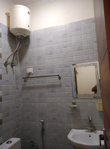 Bathroom in 1 BHK Builder Floor at JVTS Gardens, Chattarpur – for Rent