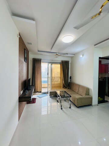 Living Room in 1 BHK Apartment at Triveni Dynamic Ultima Bliss, Kalyan West – for Rent