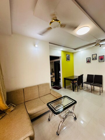 Living Room in 1 BHK Apartment at Triveni Dynamic Ultima Bliss, Kalyan West – for Rent