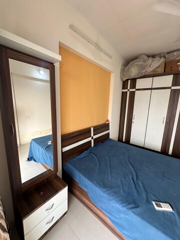Bedroom in 1 BHK Apartment at Triveni Dynamic Ultima Bliss, Kalyan West – for Rent