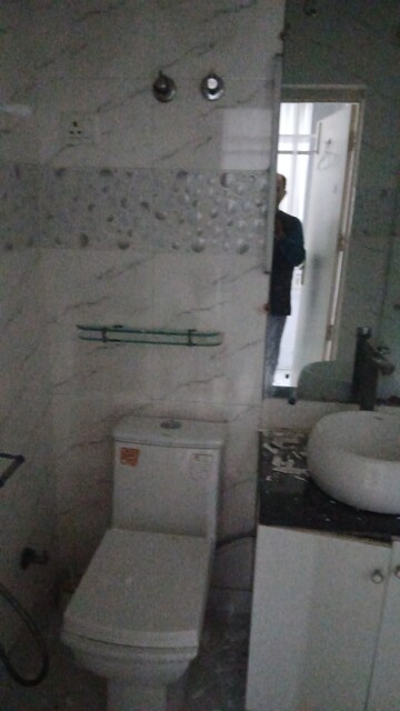 Bathroom in 2 BHK Apartment at Overseas Apartment, Sector 62 – for Rent