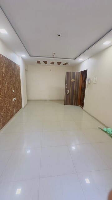 Living Room in 1 BHK Apartment at Arihant Anmol, Badlapur East – for Sale
