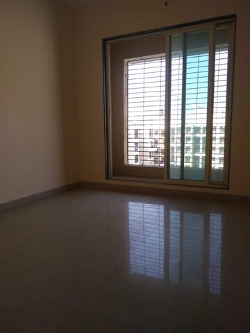Bedroom in 2 BHK Apartment at Mohan Highlands, Badlapur East – for Sale