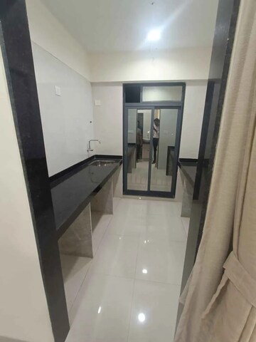 Building Lobby in 1 BHK Apartment at Ruparel Sereno, Vasai East – for Sale