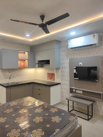 Kitchen in Studio Apartment at Okay Plus Solitaire Suites, Ramnagariya – for Rent