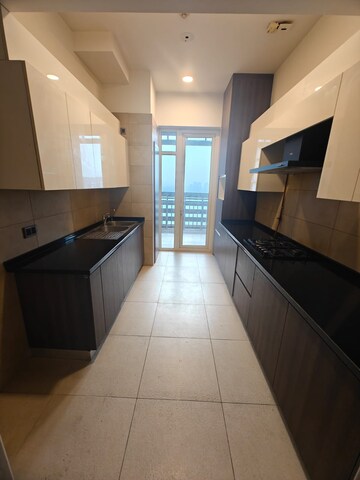Kitchen in 3 BHK Apartment at Mahindra Luminare, Sector 59 – for Sale