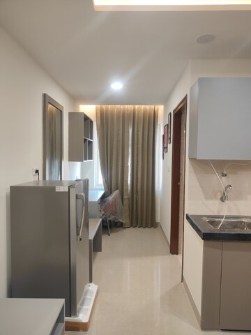 Living Room in Studio Apartment at Okay Plus Solitaire Suites, Ramnagariya – for Rent