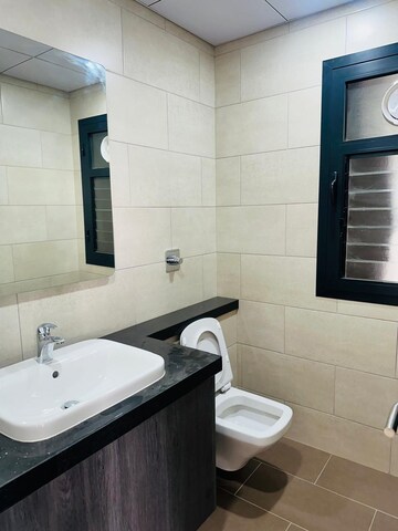 Bathroom in 3 BHK Apartment at Shapoorji Pallonji Joyville Phase 2, Sector 102 – for Rent
