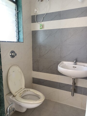 Bathroom in 2 BHK Apartment at Puraniks Kanchanpushp Complex, Kavesar – for Sale