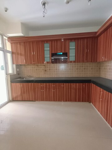Kitchen in 3 BHK Apartment at Mahagun Mywoods, Sector 16c Greater Noida – for Sale
