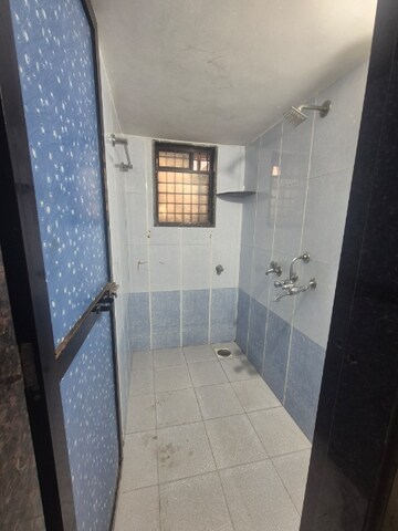Bathroom in 1 BHK Apartment at Shyam Gokul Garden, Kandivali East – for Rent