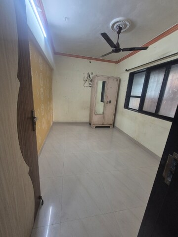 Bedroom in 1 BHK Apartment at Shyam Gokul Garden, Kandivali East – for Rent