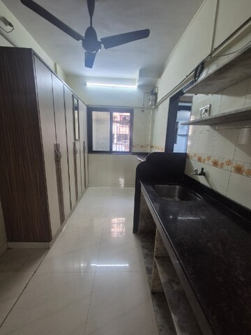 Kitchen in 1 BHK Apartment at Shyam Gokul Garden, Kandivali East – for Rent