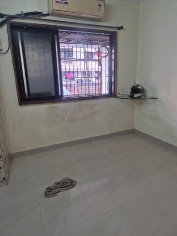 Room in 1 BHK Apartment at Shyam Gokul Garden, Kandivali East – for Rent