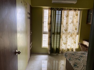 Living Room in 2 BHK Apartment at Lodha Amara, Kolshet Road – for Rent