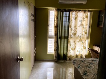 Living Room in 2 BHK Apartment at Lodha Amara, Kolshet Road – for Rent