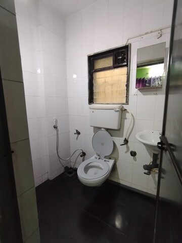 Bathroom in 1 BHK Apartment at Krishna Greenland Park Vastu Federation, Ghodbunder Road – for Sale