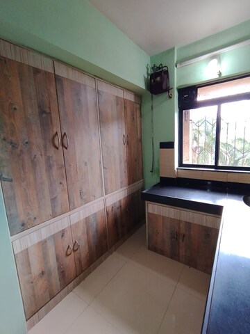 Kitchen in 1 BHK Apartment at Krishna Greenland Park Vastu Federation, Ghodbunder Road – for Sale