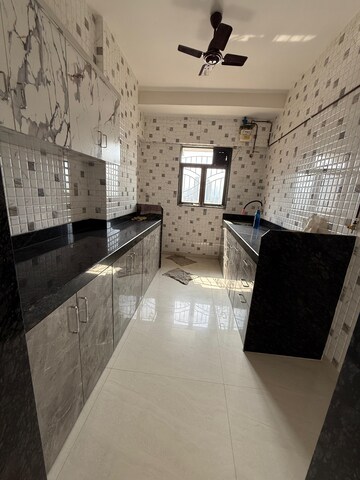 Kitchen in 2 BHK Apartment at Harshal Devchhaya, Dahisar East – for Sale