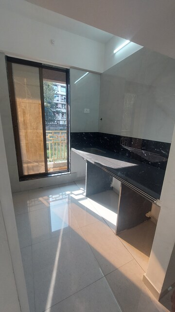 Kitchen in 1 BHK Apartment at Omkar Plaza Badlapur, Badlapur East – for Sale
