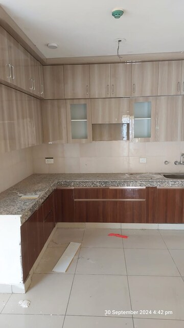 Kitchen in 4 BHK Apartment at Kbnows Apartment, Sector 16 Greater Noida – for Rent