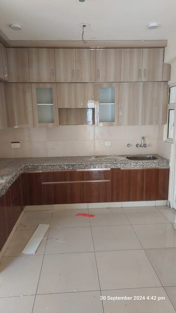 Kitchen in 4 BHK Apartment at Kbnows Apartment, Sector 16 Greater Noida – for Rent