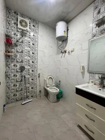 Bathroom in 3 BHK Builder Floor at Freedom Fighters Enclave, Saket – for Rent