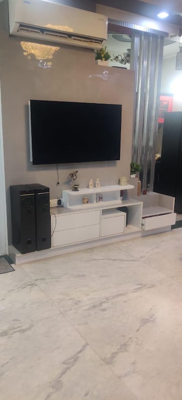 Living Room in 2 BHK Apartment at Saya Gold Avenue, Vaibhav Khand – for Rent