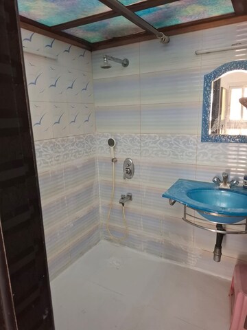 Bathroom in 3 BHK Apartment at Tarapore Towers, Andheri West – for Rent