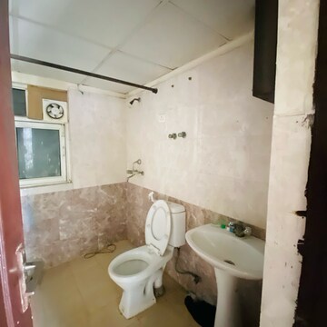 Bathroom in 2.5 BHK Apartment at Aims Golf City, Noida Central – for Rent