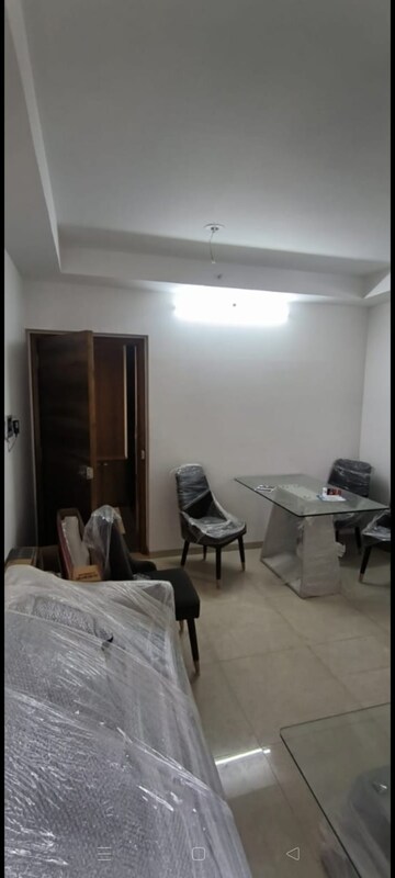 Living Room in 1 BHK Apartment at UK Iridium, Kandivali East – for Rent