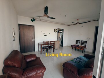 Living Room in 2 BHK Apartment at Runwal Eirene, Balkum Pada – for Sale