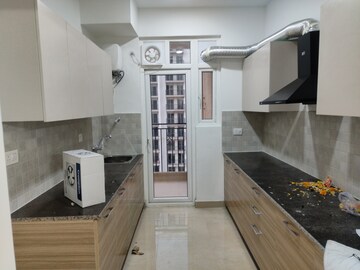 Kitchen in 3 BHK Apartment at ATS Homekraft Pious Hideaways, Sector 150 – for Rent