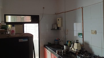 Kitchen in 2 BHK Apartment at Gajanan Height, Dombivli East – for Sale