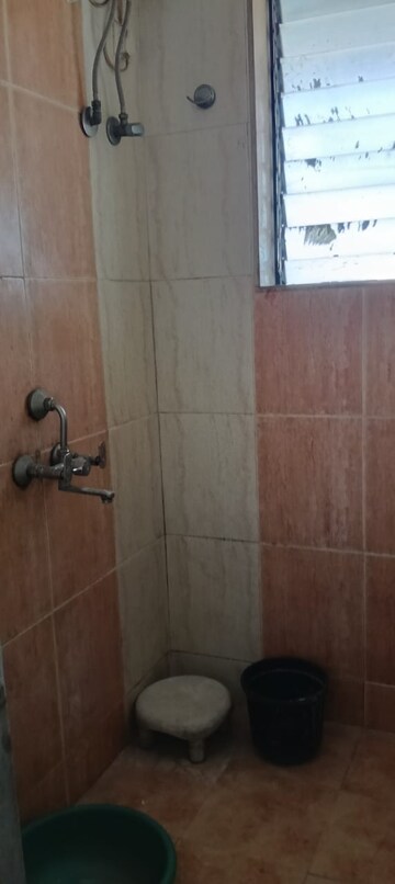 Bathroom in 1 BHK Apartment at Suyash Tower, Kopar Khairane – for Rent