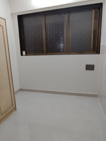 Master Bedroom in 1 BHK Apartment at Sanjeevan Building, Dadar West – for Rent