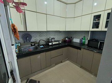 Kitchen in 3 BHK Apartment at Ajnara Homes, Sector 16b Greater Noida – for Rent