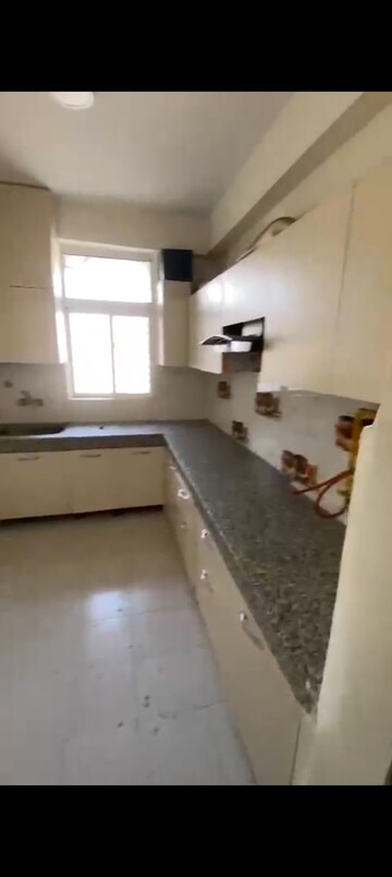 Kitchen in 3 BHK Apartment at Proview Officer City, Raj Nagar Extension – for Rent