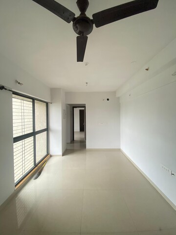 Living Room in 1 BHK Apartment at Lodha Downtown, Dombivli East – for Sale